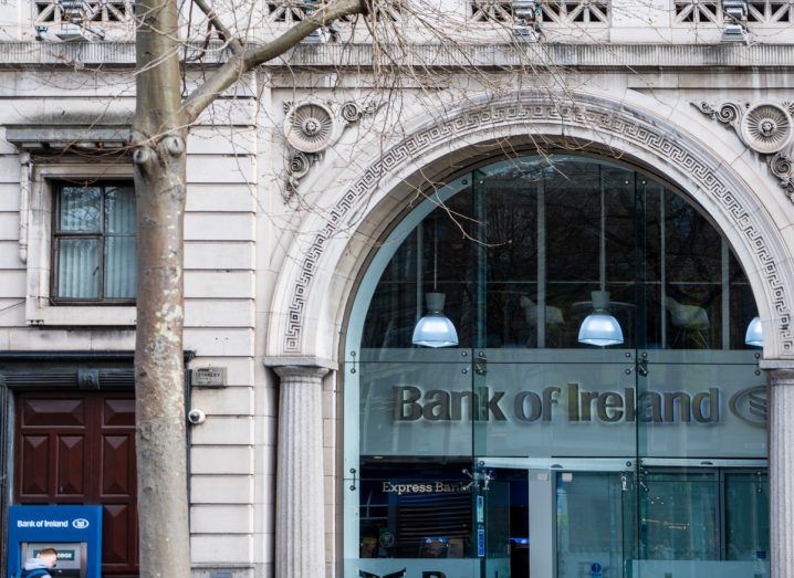 Bank of Ireland logo on a building and an ATM outside it.