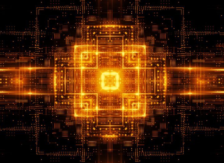 Illustration of an orange digital square with orange light going off to the sides. Used as a concept for quantum computing.