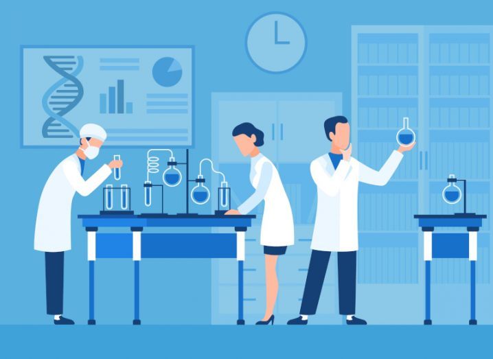 Illustration of three researchers in a lab, looking at vials of liquid.