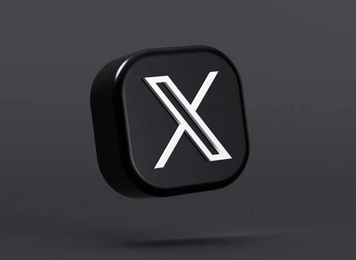 3D icon of X floating in a black background.