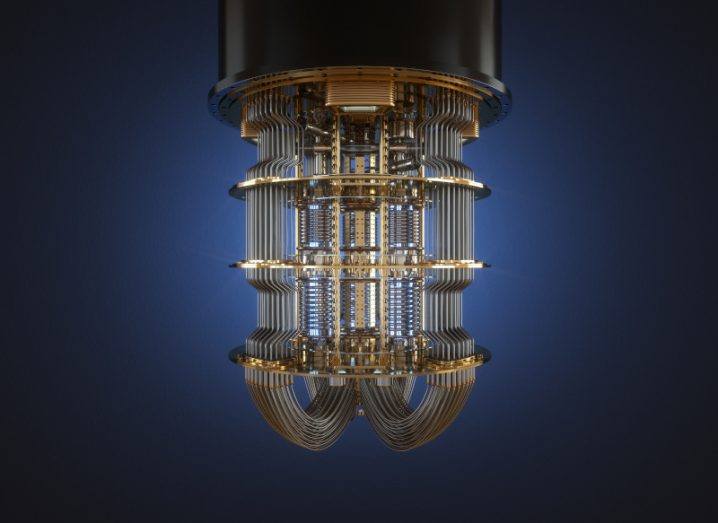 Close-up of a quantum computer against a dark blue background.