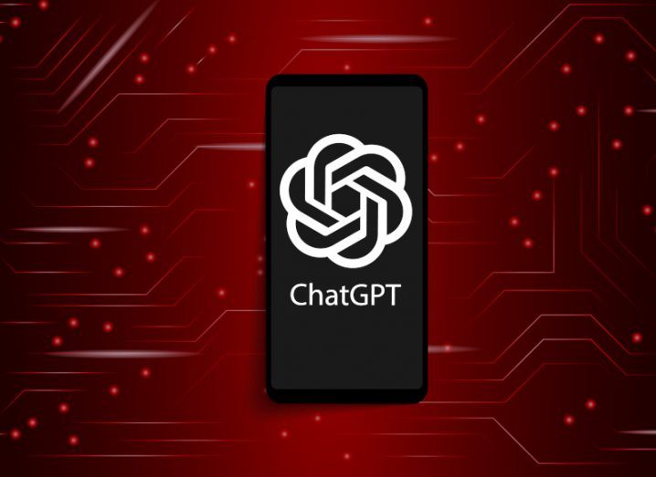 The ChatGPT logo on a smartphone screen, which is in the middle of a red background with digital lines visible across the image.