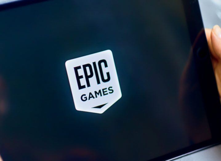 The Epic Games logo on the front of a digital tablet screen.