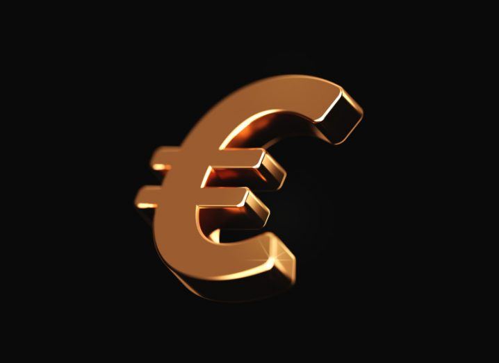 Illustration of a golden euro symbol floating in a black background.