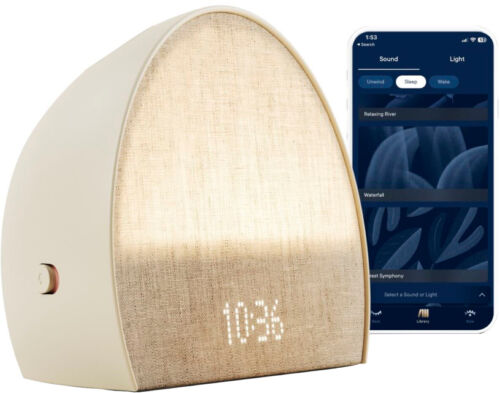 The Hatch Restore 2 alarm clock with a smartphone.