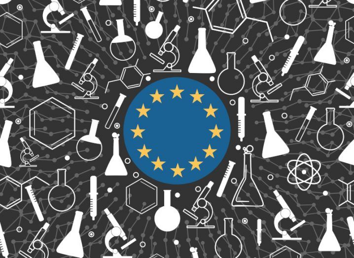 Illustration of the EU flag symbol surrounded by a dark background that has various research test tubes, liquid containers and microscopes surrounding it.
