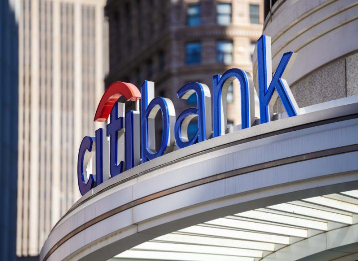 The Citi or Citibank logo on the top of a building entrance.