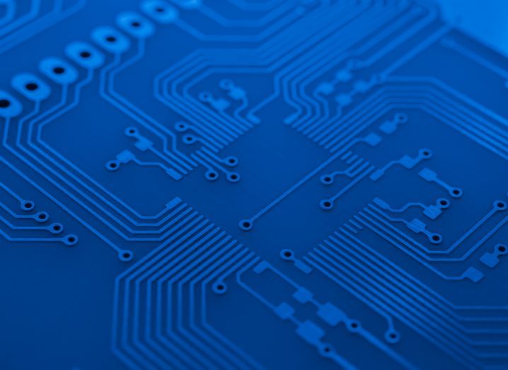 CLose-up of a computer chip in blue.