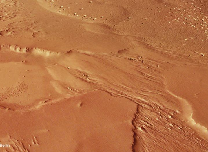 Photo of the arid and dusty surface of Mars.