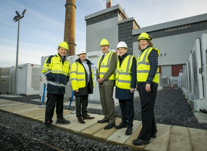 A group of people wearing industrial outfits at an ESB site.