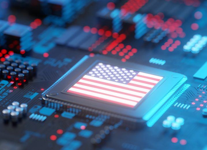 A 3D render of a semiconductor fixed on a motherboard, with the US flag placed on the semiconductor.
