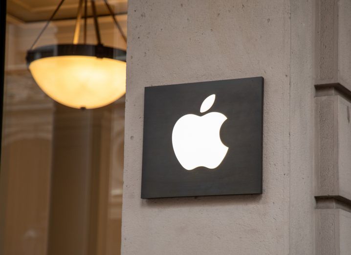 Apple logo on a wall.