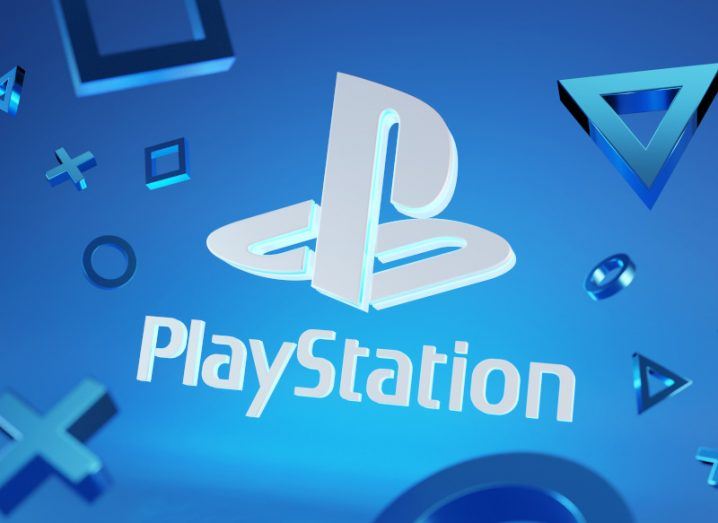 A digital graphic of PlayStation's logo layered over a light blue background while geometric shapes float around it.
