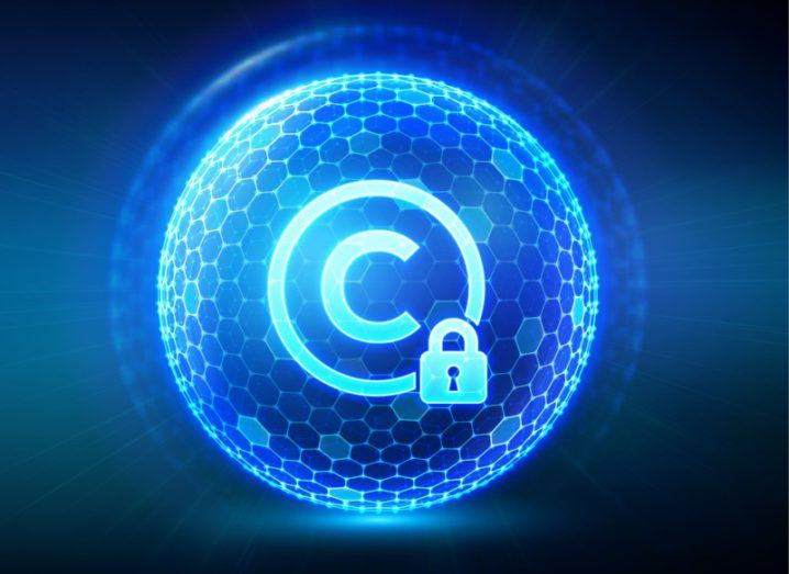 A copyright logo in a blue orb with a lock on it. Used to show the concept of a Fairly Trained AI model.