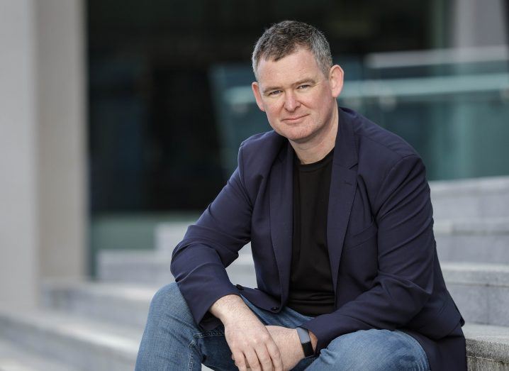 Headshot of RentDodo CEO and co-founder Conor McGarry seated on outdoor steps.