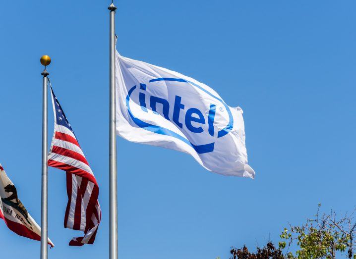 Two US flags and an Intel flag with the company logo on it.