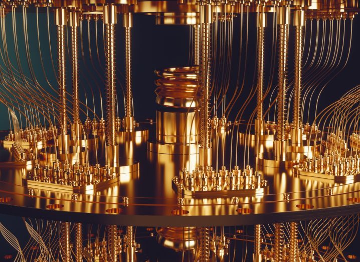 Close-up of a gold coloured quantum computer.