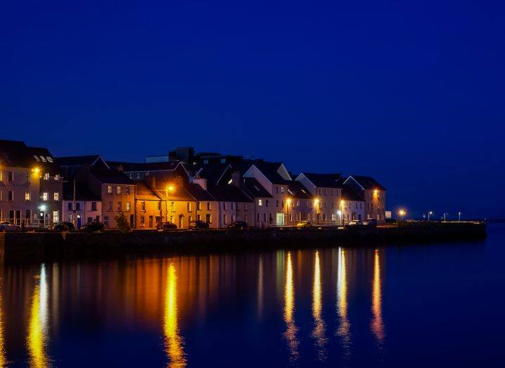 Photo of houses in Galway Port at night.