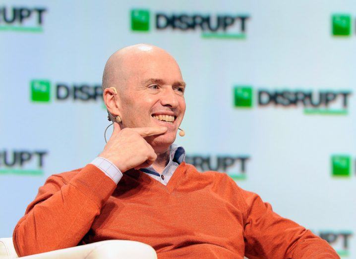 Andreessen Horowitz co-founder Ben Horowitz sitting on a chair at an event.