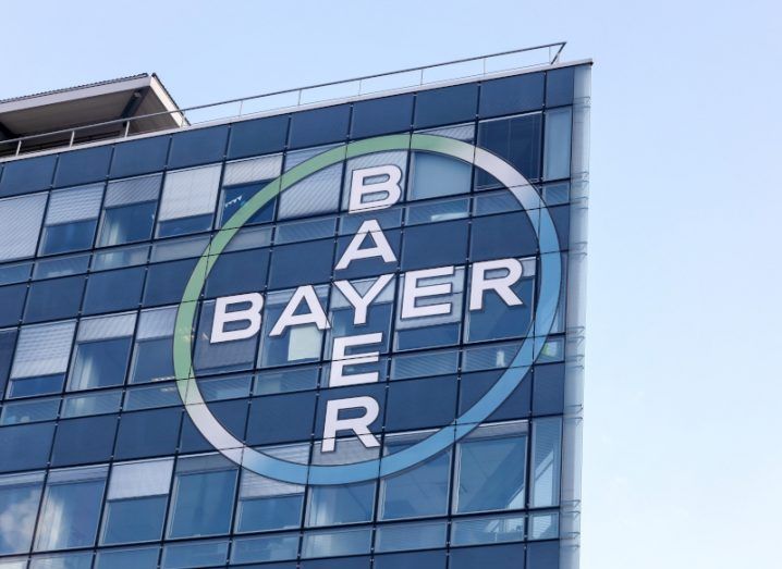 The Bayer logo on the side of a building.