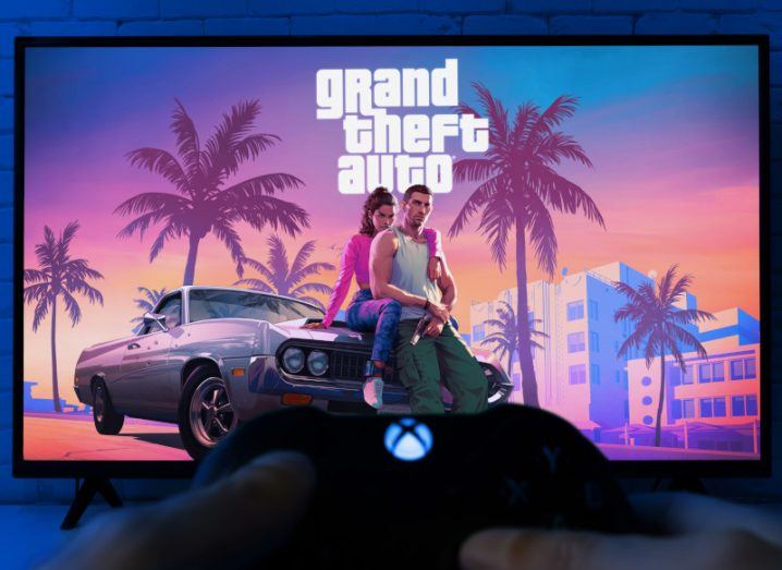 Grand Theft Auto 6 on a TV screen with an Xbox controller in the foreground.
