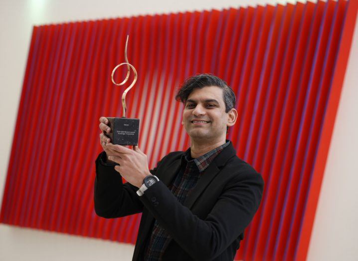 Photo of Doctor Ajay Menon of SusBioME holding the VentureLaunch trophy in UCD>