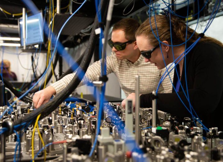Quantinuum researchers working in a quantum lab.