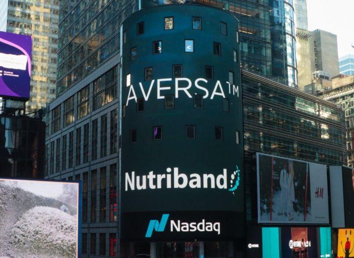 Nutriband logo on a large screen in New York.