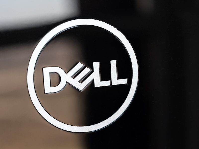 A white Dell logo in a circle on a black monitor.